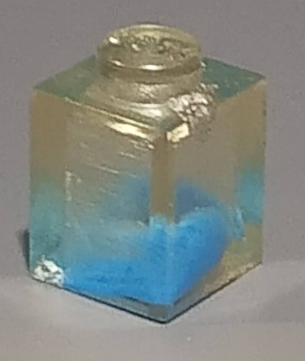 1x1 marbled trans clear brick