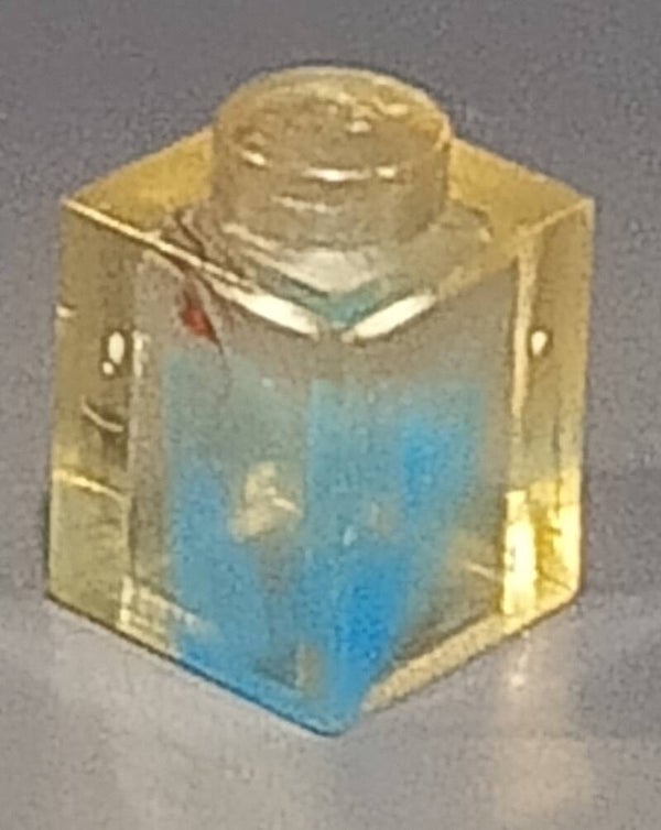 1x1 marbled trans clear brick