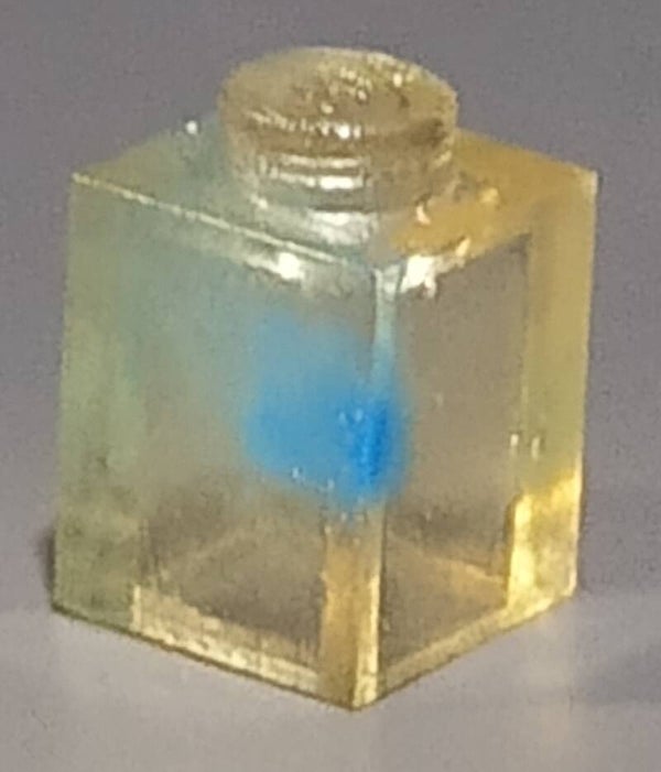 1x1 marbled trans clear brick