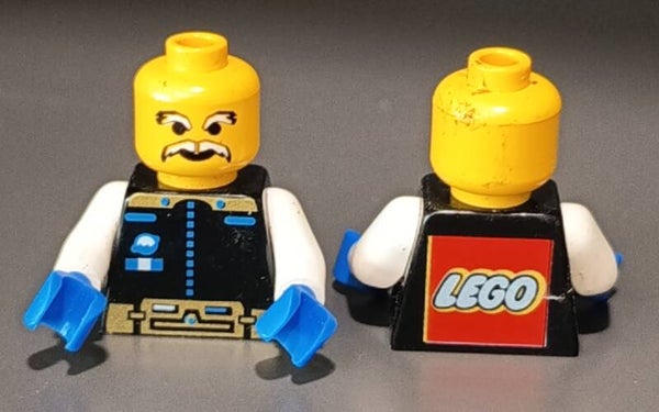 Minifigure torso with lego logo on back