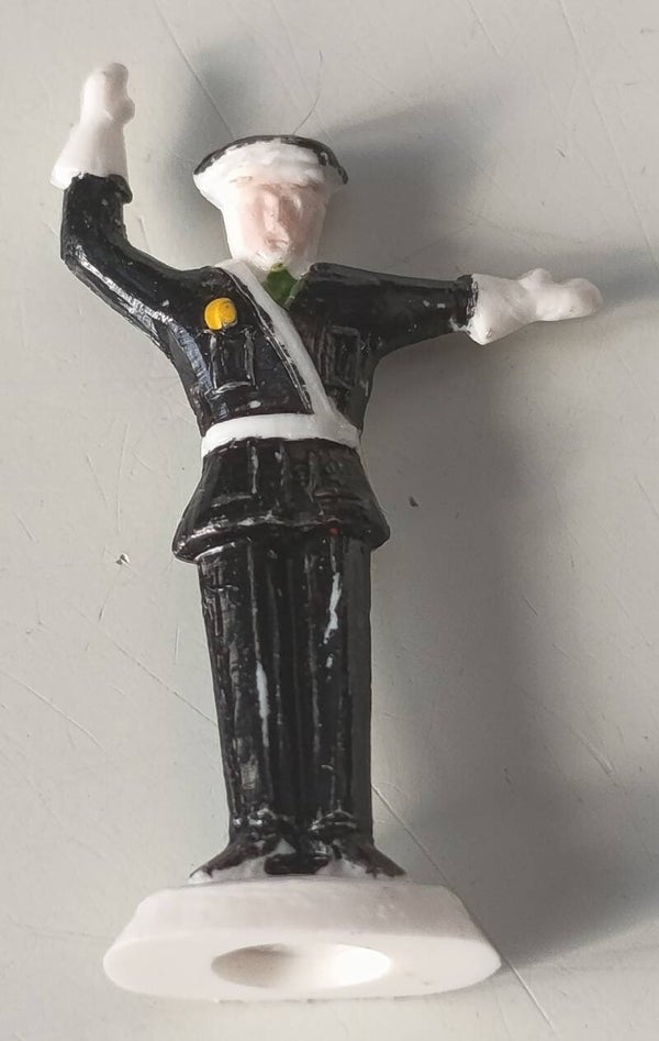 Police man one hand up