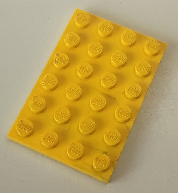 Yellow plate with a little marbled