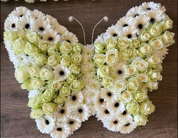 Rouwbloemstuk vlinder