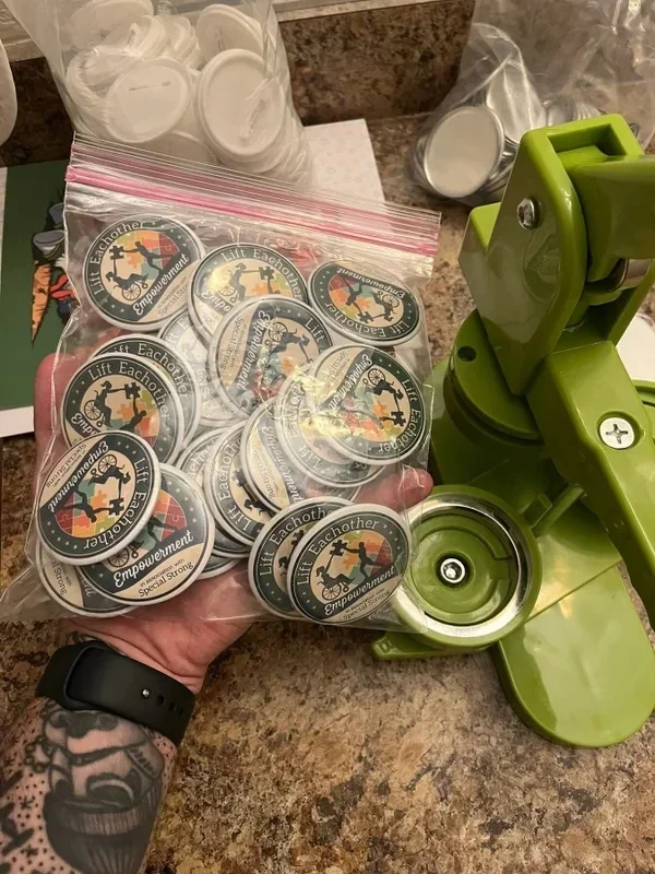 2.5 inch campaign buttons featuring our logo