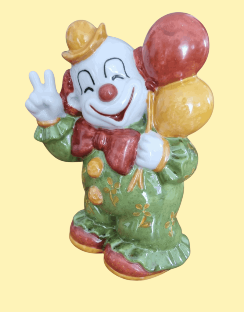 Handbemalte Porzellan-Spardose als Clown mit Luftballons