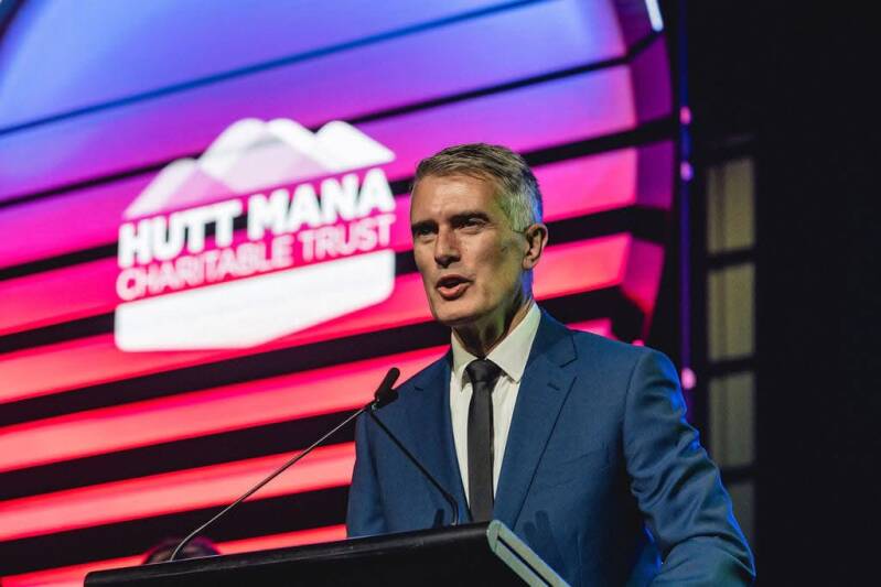 Tony stallinger speaking on stage for Hutt Mana Charitable Trust