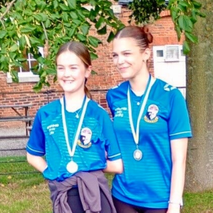 Medalists, Olivia and Emily