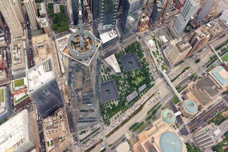Wide-angle aerial view over World Trade Center and Lower Manhattan, looking south-east towards the East River