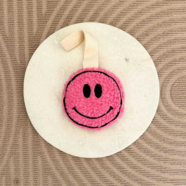 Little smiley speendoekje roze
