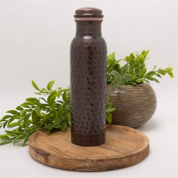 Puur koperen waterfles gehamerd antique ± 950 ml