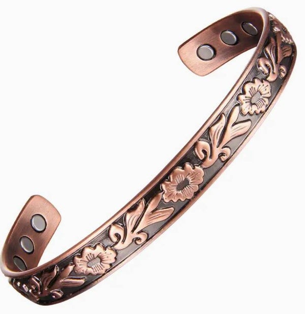Koperen armband met bloemmotief