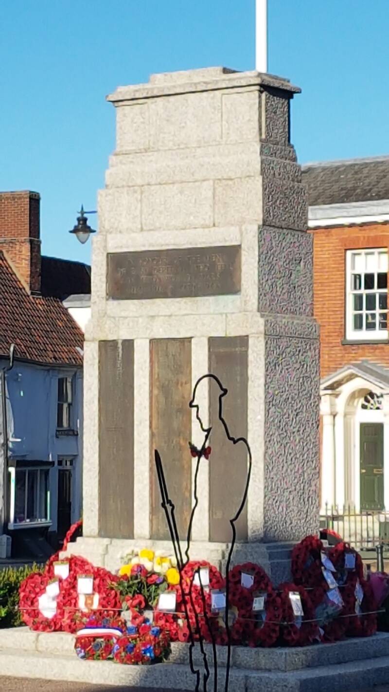 A vibrant full-color view of the Dereham War Memorial, a site for local history and ancestral remembrance.