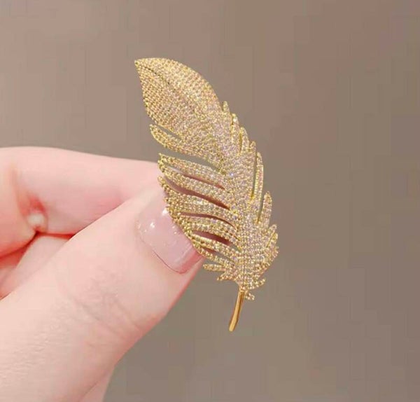 Broche Plume doré