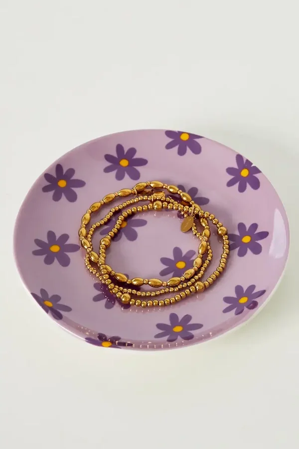 Schaaltje rond paars met bloemen