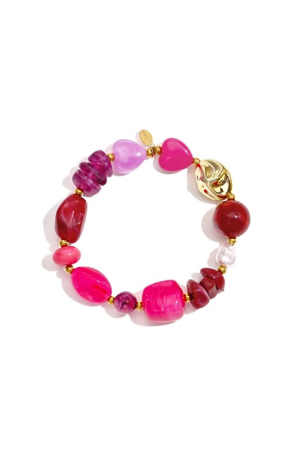 Armband verschillende kralen roze/rood/goud