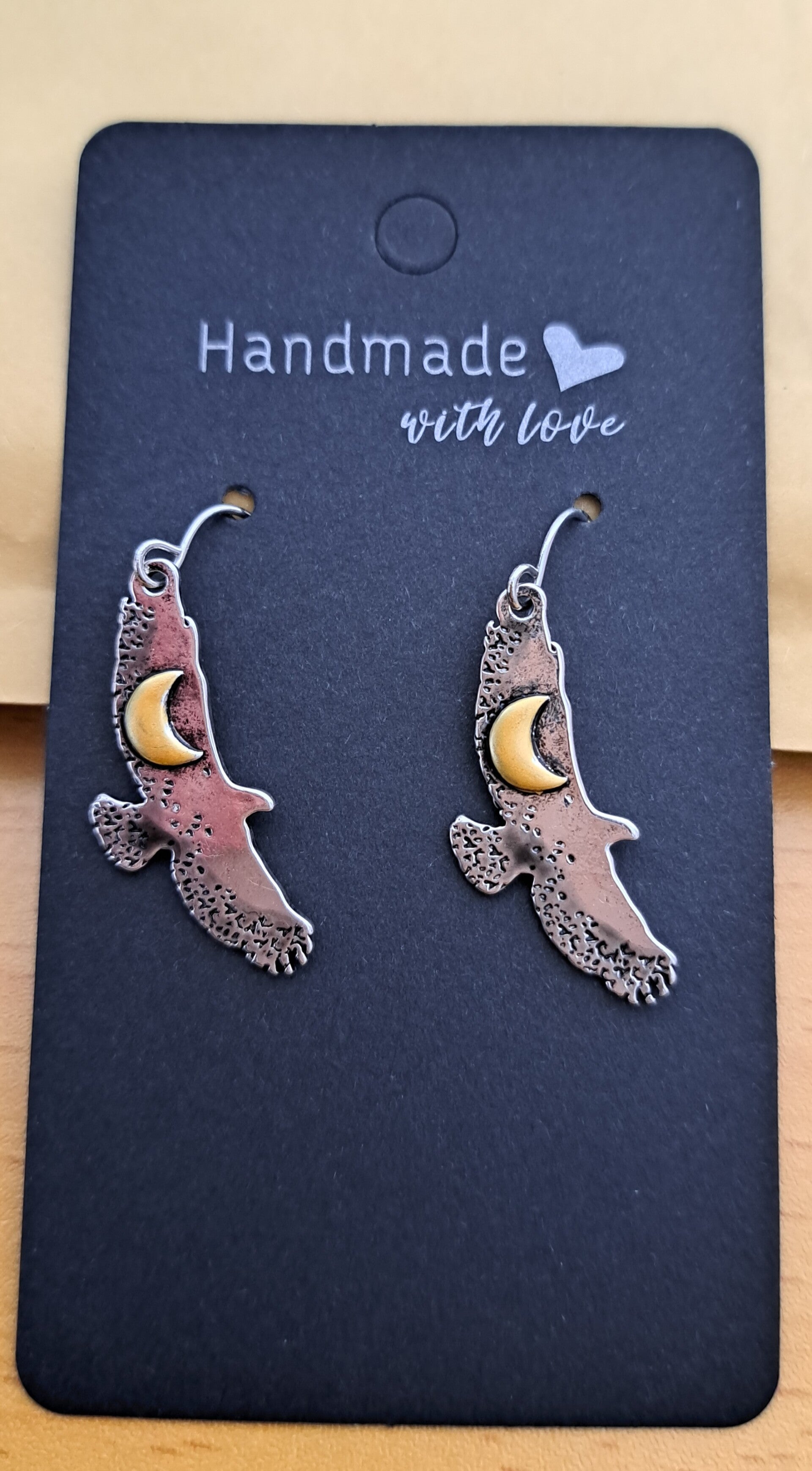 Raven steel and copper drop earrings