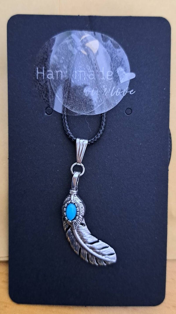 Handmade feather with blue stone pendant