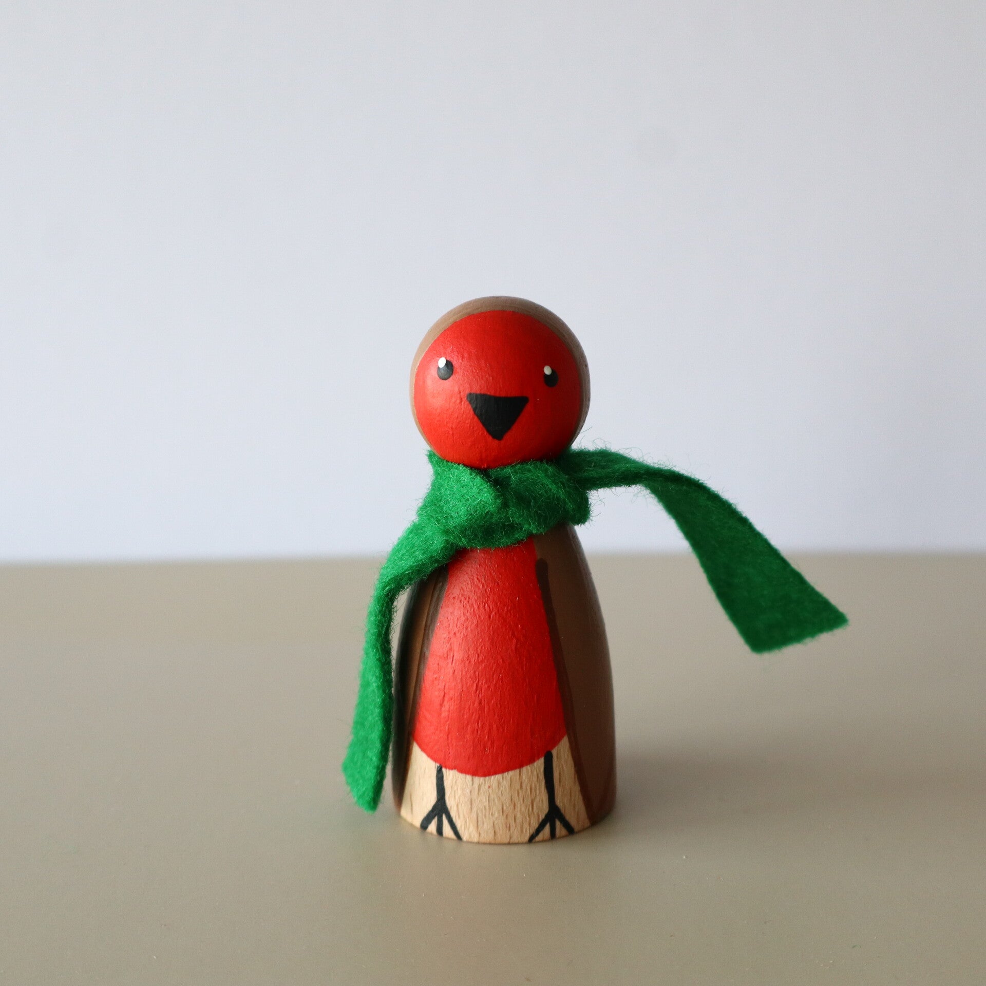 Peg doll roodborstje