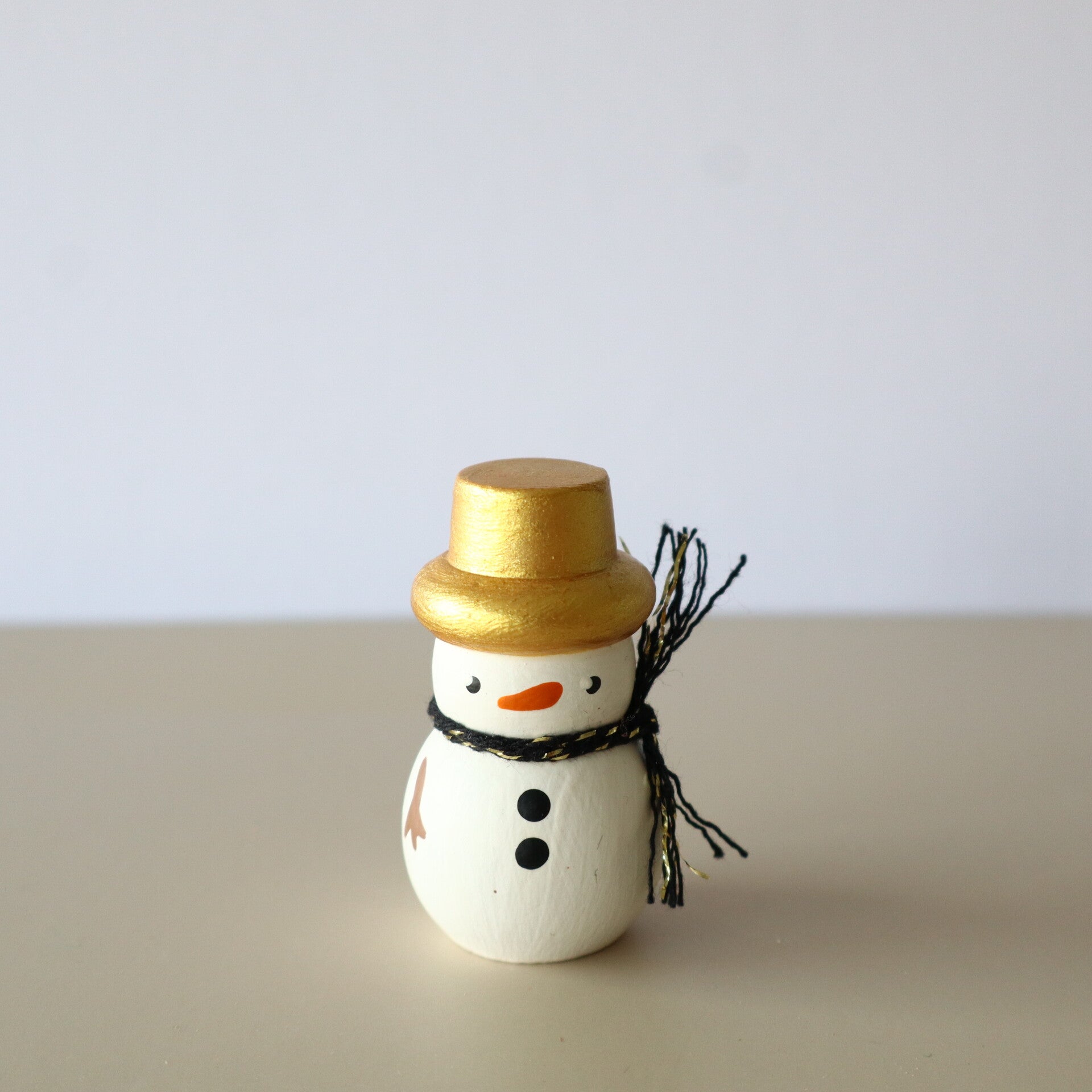 Peg doll - sneeuwpop goud