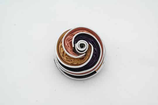 kleine broche tornado