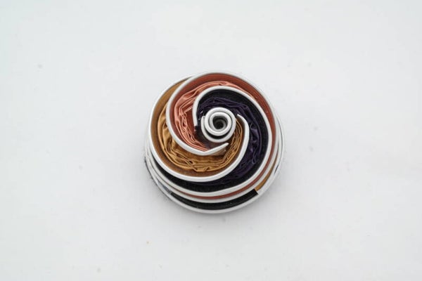 kleine broche tornado