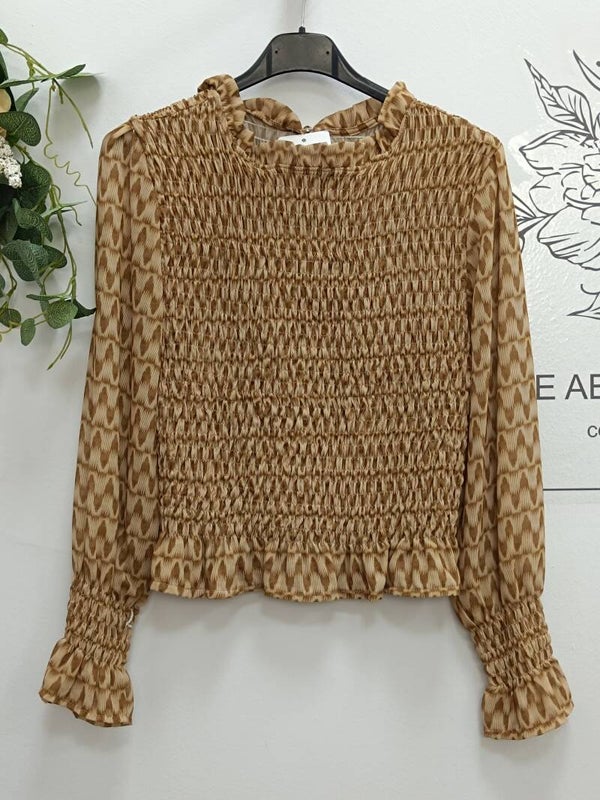 BLUSA ROMANTICA GEOMETRICA.