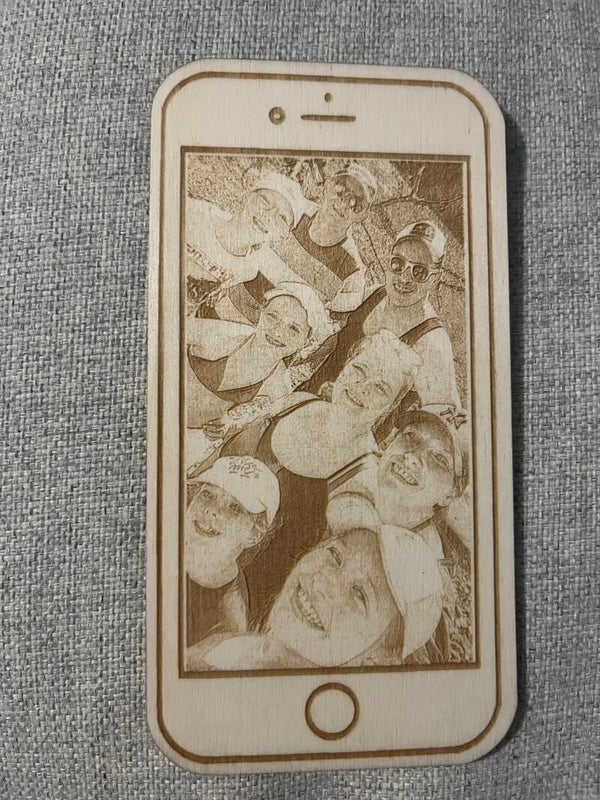 Gsm met foto en tekst op achterkant