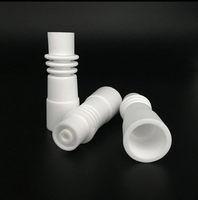 Ceramic dab nail showing off its clean white finish and heat retention design.