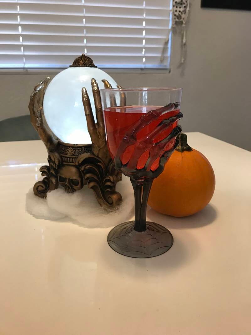 bubbly red Halloween cocktails with cherries, a seasonal treat for cannabis edibles and Stoner Strategies enthusiasts 