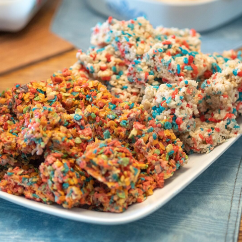 Vibrant, square-cut Rice Krispie Treats and Fruity Pebbles Cannabis Cereal Bars, a perfect snack for cannabis edibles and Stoner Strategies readers
