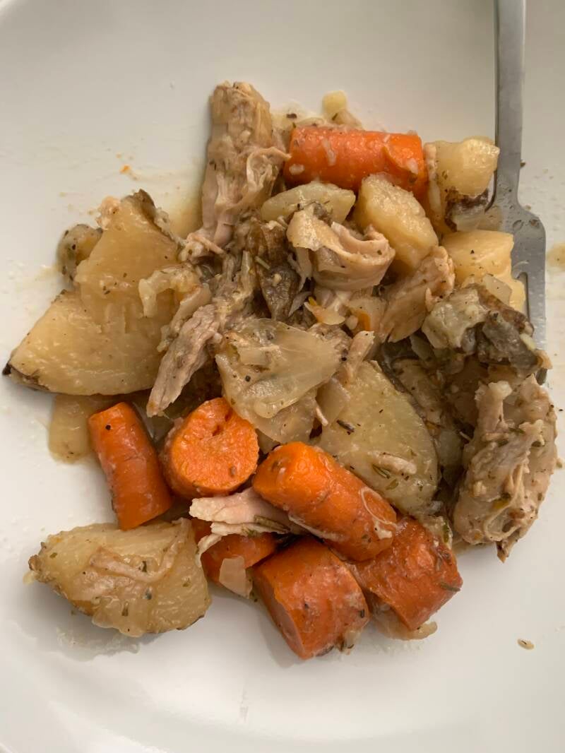 A steaming bowl of homemade Cannabis Shredded Chicken Veggie Stew, perfect for cannabis edibles and stoner strategies enthusiasts.