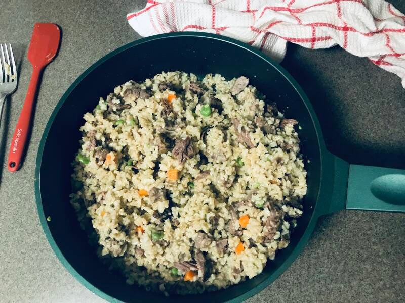 A bowl of healthy Prime Rib and CBD Dog Food, perfect for cannabis edibles and Stoner Strategies enthusiasts