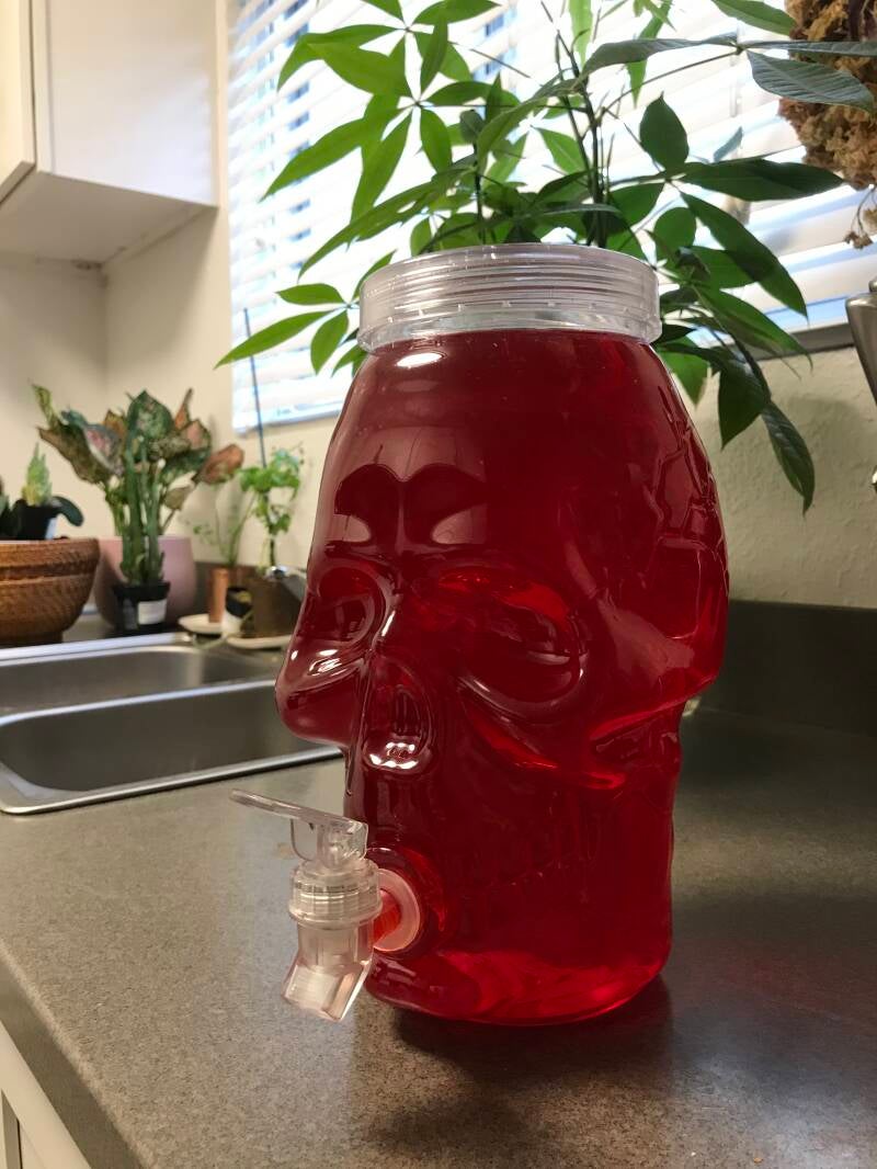 A pitcher of Cannabis Cherry Kool-Aid, perfect for cannabis edibles and Stoner Strategies enthusiasts