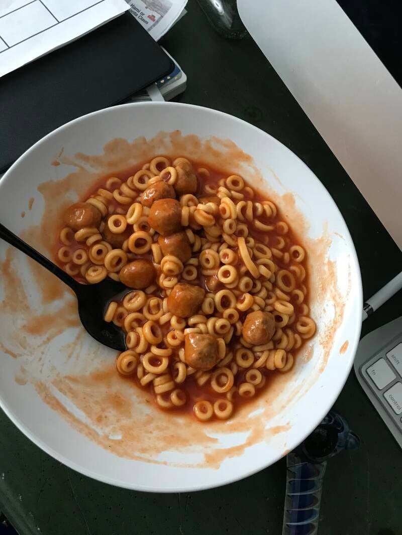 A warm bowl of Cannabis Spaghetti O’s with meatballs, the ultimate quick meal for cannabis edibles and stoner strategies enthusiasts