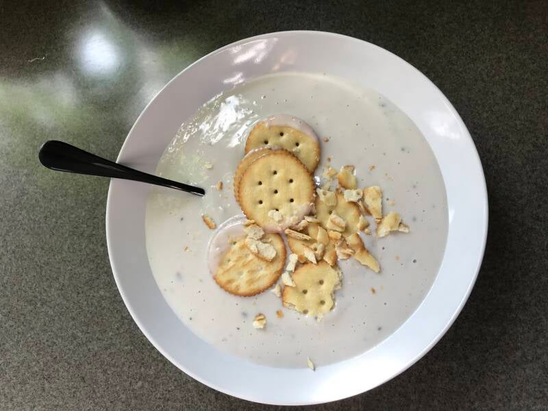 A steaming bowl of Cannabis Cream of Mushroom Soup, perfect for cannabis edibles and Stoner Strategies enthusiasts