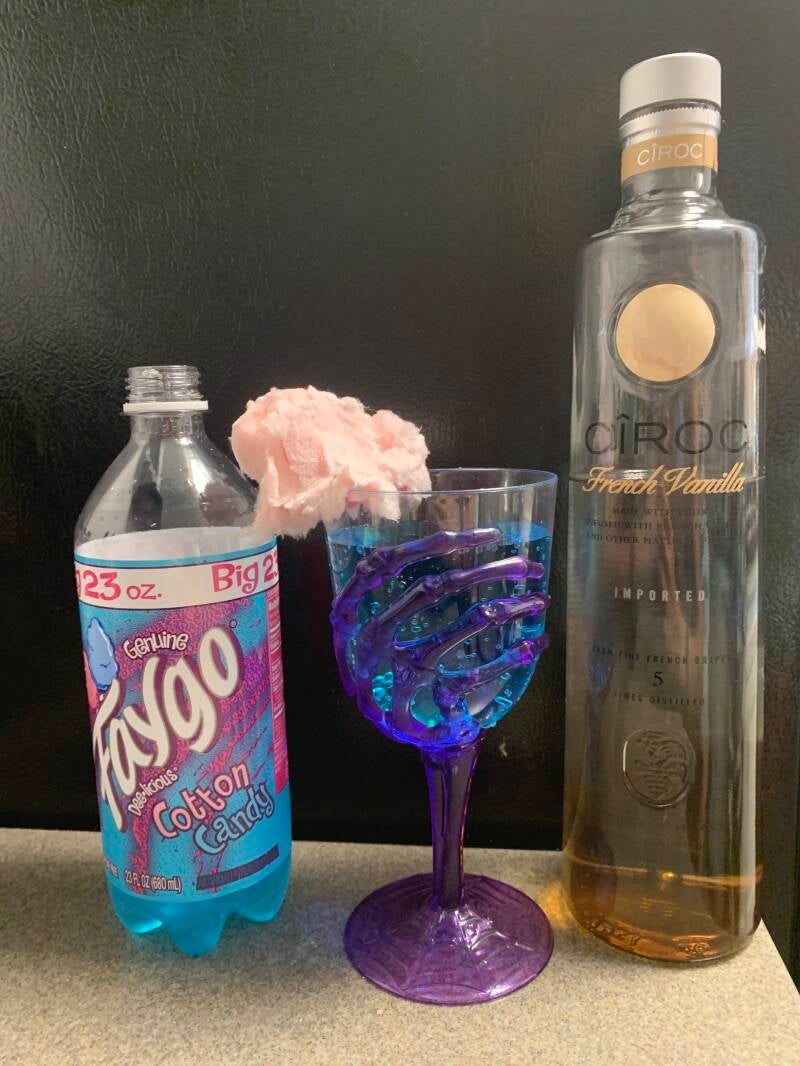 A vibrant purple Color-Changing Cannabis Cocktail, a magical drink for cannabis edibles and Stoner Strategies enthusiasts 
