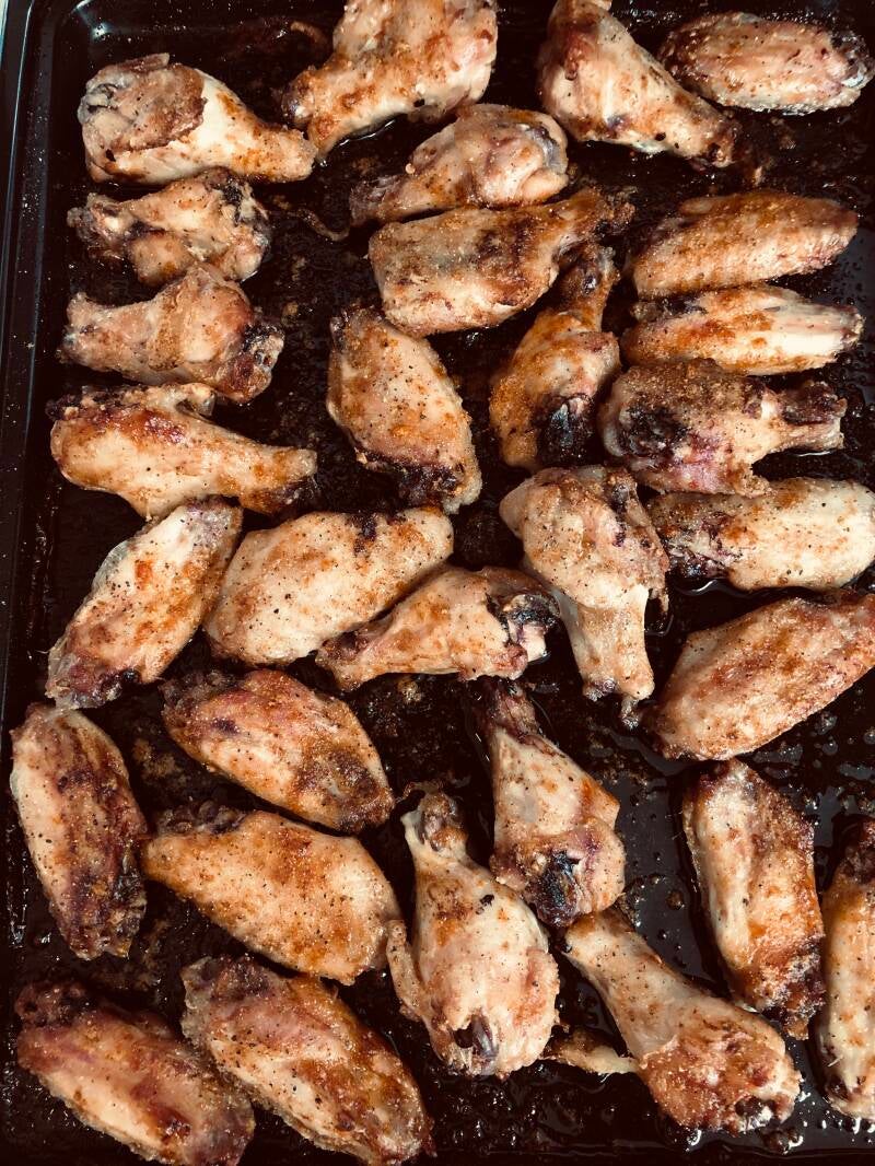 Golden brown Cannabis Herb Chicken Wings with a honey glaze, perfect for cannabis edibles and stoner strategies enthusiasts.