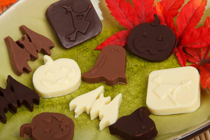 Homemade Halloween cannabis chocolates in festive molds, a treat for cannabis edibles and stoner strategies enthusiasts