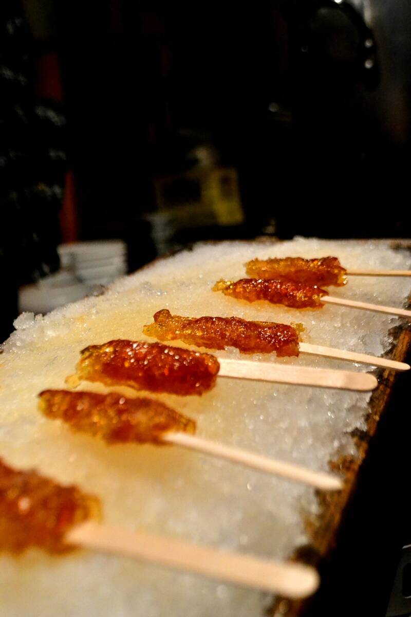 Homemade Cannabis Maple Snow Candy lollipops, perfect for cannabis edibles and stoner strategies enthusiasts.