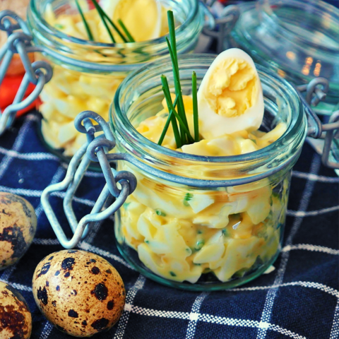 A bowl of creamy Cannabis Deviled Egg Salad served, a perfect choice for cannabis edibles and Stoner Strategies readers