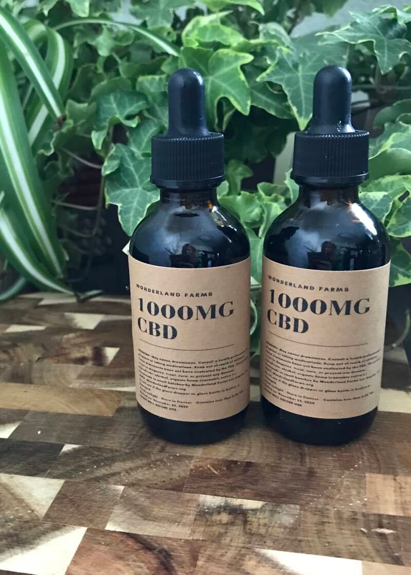 Glass dropper bottles containing cannabis tincture