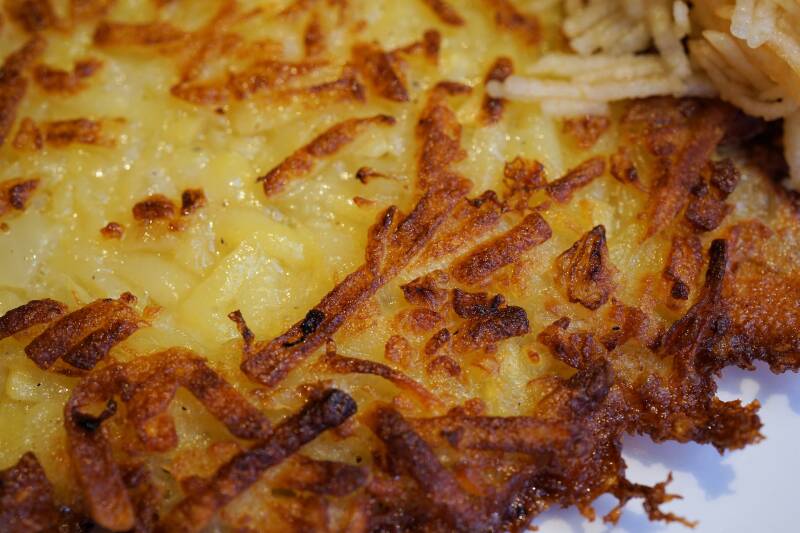 golden, crispy Cannabis Hash Browns, a breakfast staple for cannabis edibles and stoner strategies enthusiasts