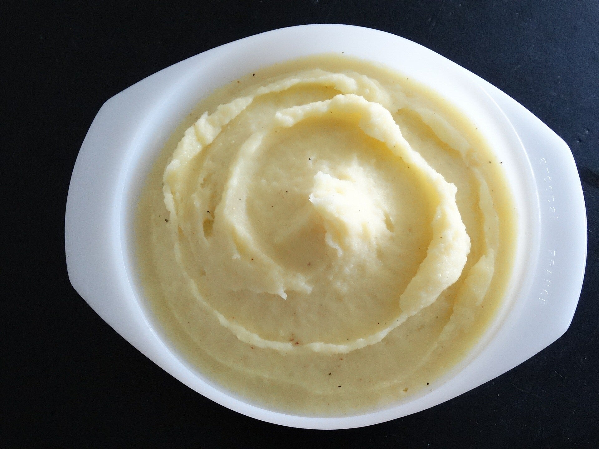 A bowl of creamy Cannabis Mashed Potatoes, the perfect comfort food for cannabis edibles and stoner strategies enthusiasts