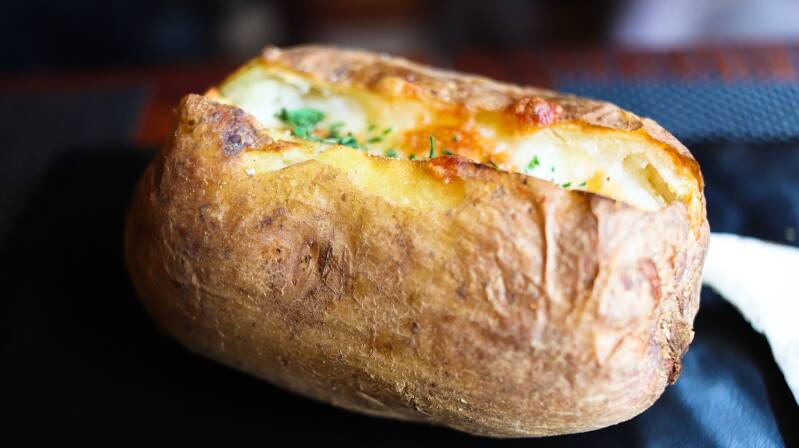 Crispy Cannabis Cheesy Bacon Baked Potatoes, a favorite for cannabis edibles and stoner strategies enthusiasts.