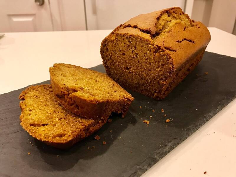 A fresh, golden loaf of Cannabis Pumpkin Bread, a perfect treat for cannabis edibles and stoner strategies enthusiasts.