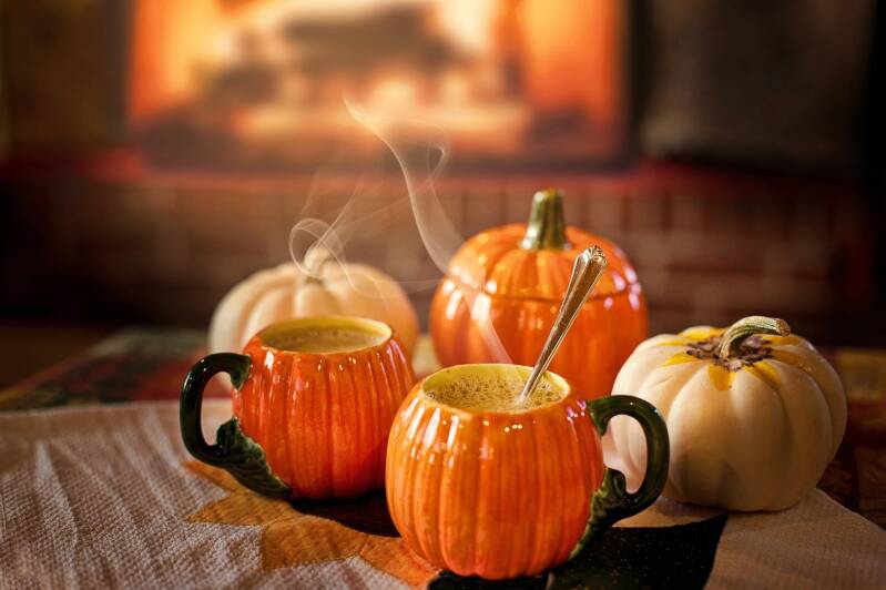 A creamy Cannabis Pumpkin Spice Latte topped with whipped cream, the ultimate treat for cannabis edibles and stoner strategies enthusiasts