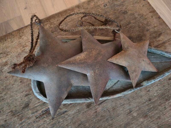 Roestkleurige metalen ster 27 cm.