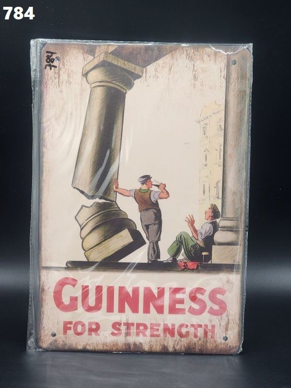 Tin Sign 784 - Guinness For Strength Leaning On Tower