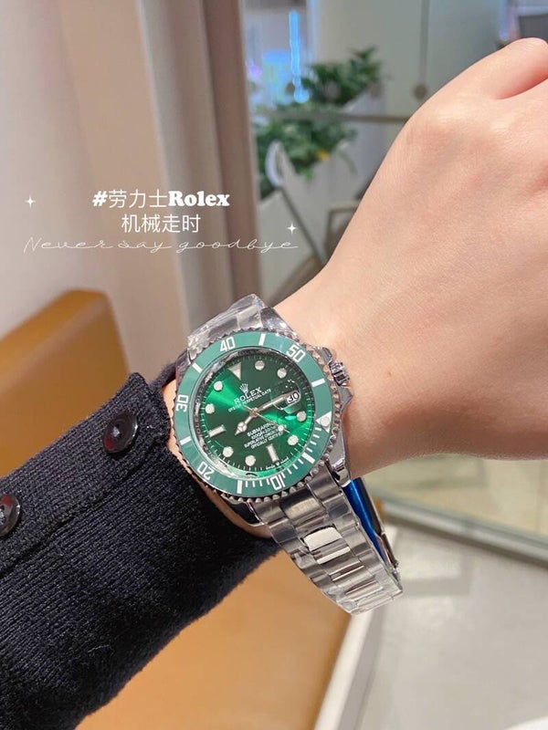 Rolex Submariner Date with a green dial and bezel