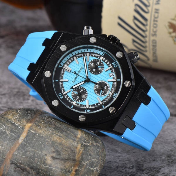 Audemars Piguet Royal Oak Offshore Chronograph wristwatch with a black case and a light blue rubber strap